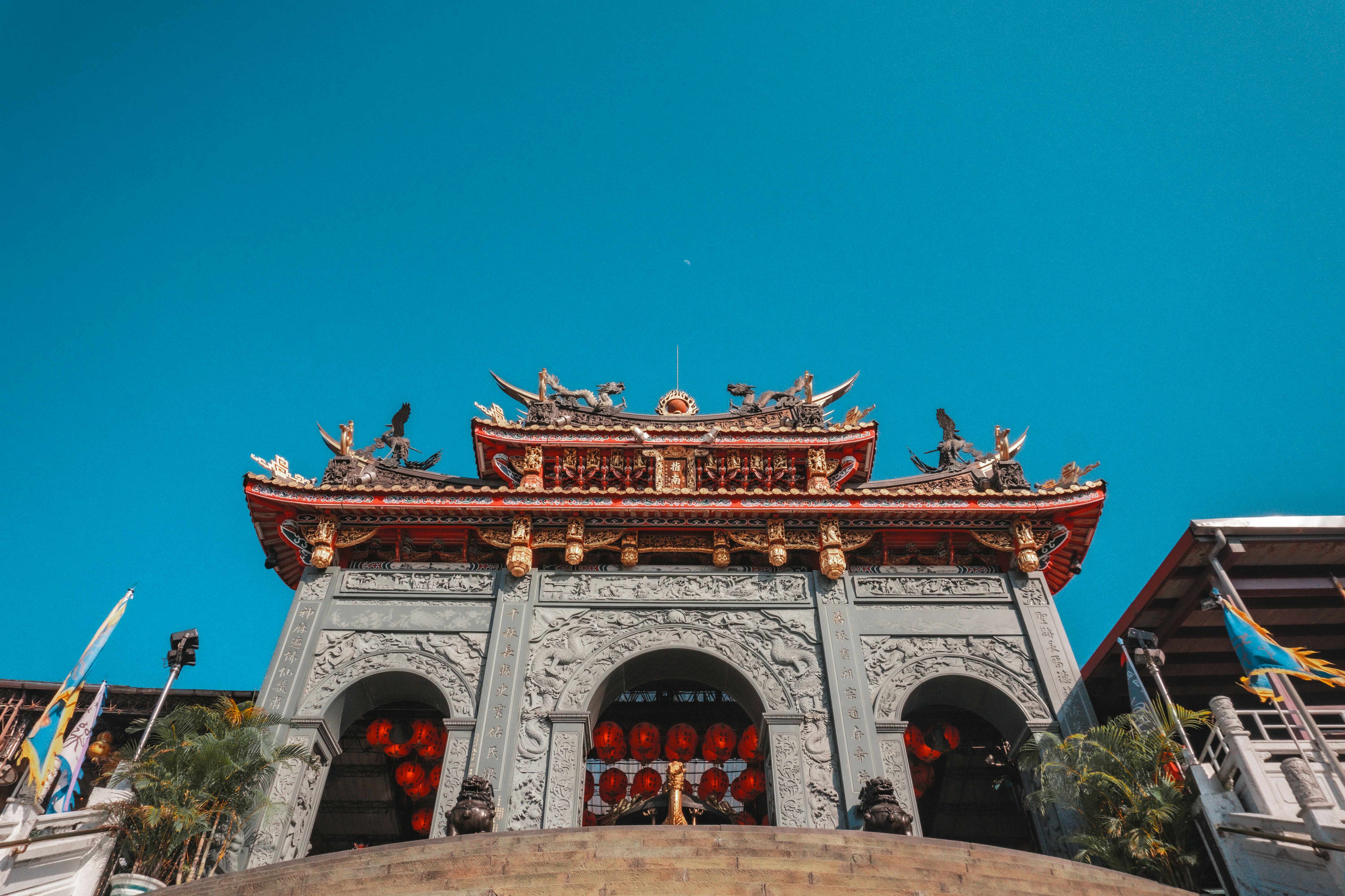 red and brown concrete building under blue sky during daytime